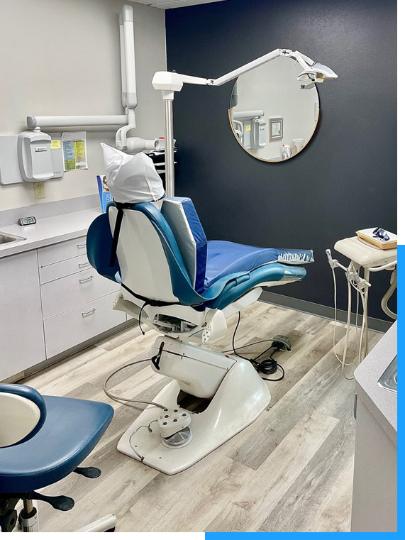 A comfortable and modern patient exam room at Krusich Dental in Leawood.